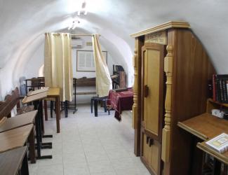 (PHOTO: Interior of the Tomb of Ruth and Jesse complex. It is used regularly as a synagogue by locals and visitors.)